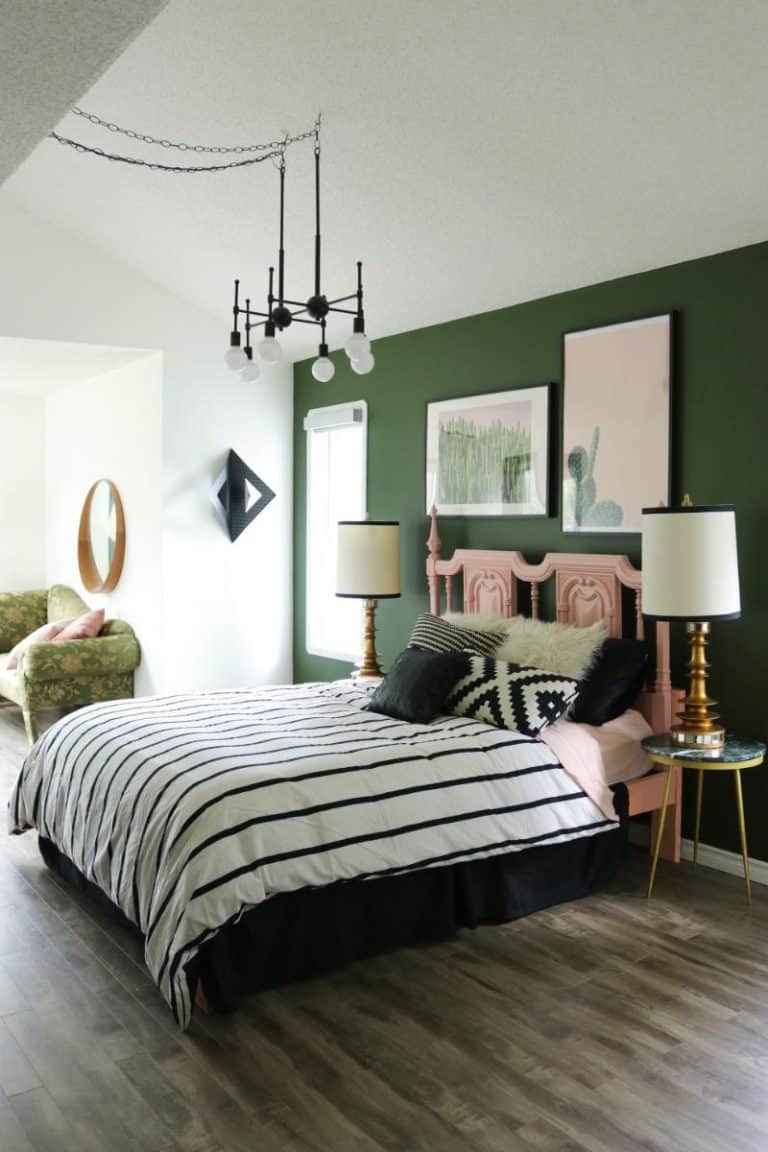 Modern bohemian style bedroom wtih vintage furniture and white, black and green colour palette