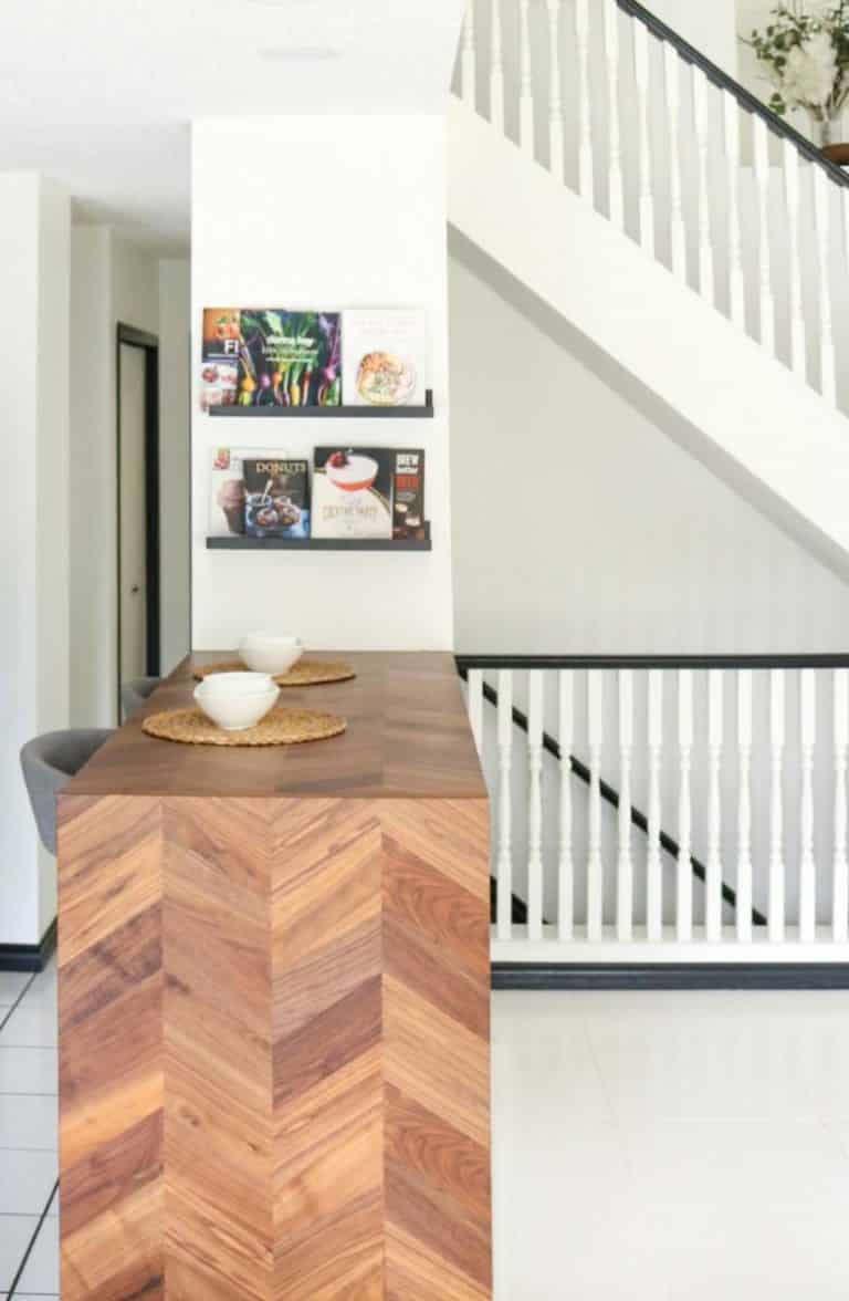 Art-deco meets eclectic and transitional style eating bar with chevron-pattern walnut waterfall butcher block