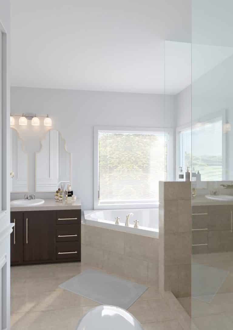 French transitional style hotel bathroom with soaker tub and tile and glass shower surround